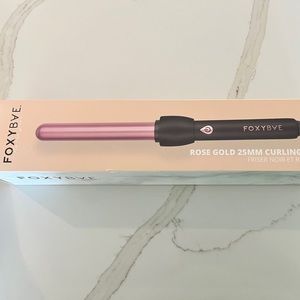 Foxybae rose gold curling wand is new in box.
